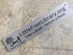 Photograph of our Little Free Library Charter number, from wwwlittlefreelibrary.org